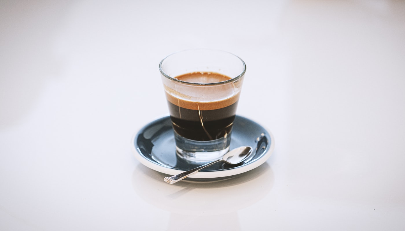 Filter-ready espresso glass representing a washed Guji lot brief